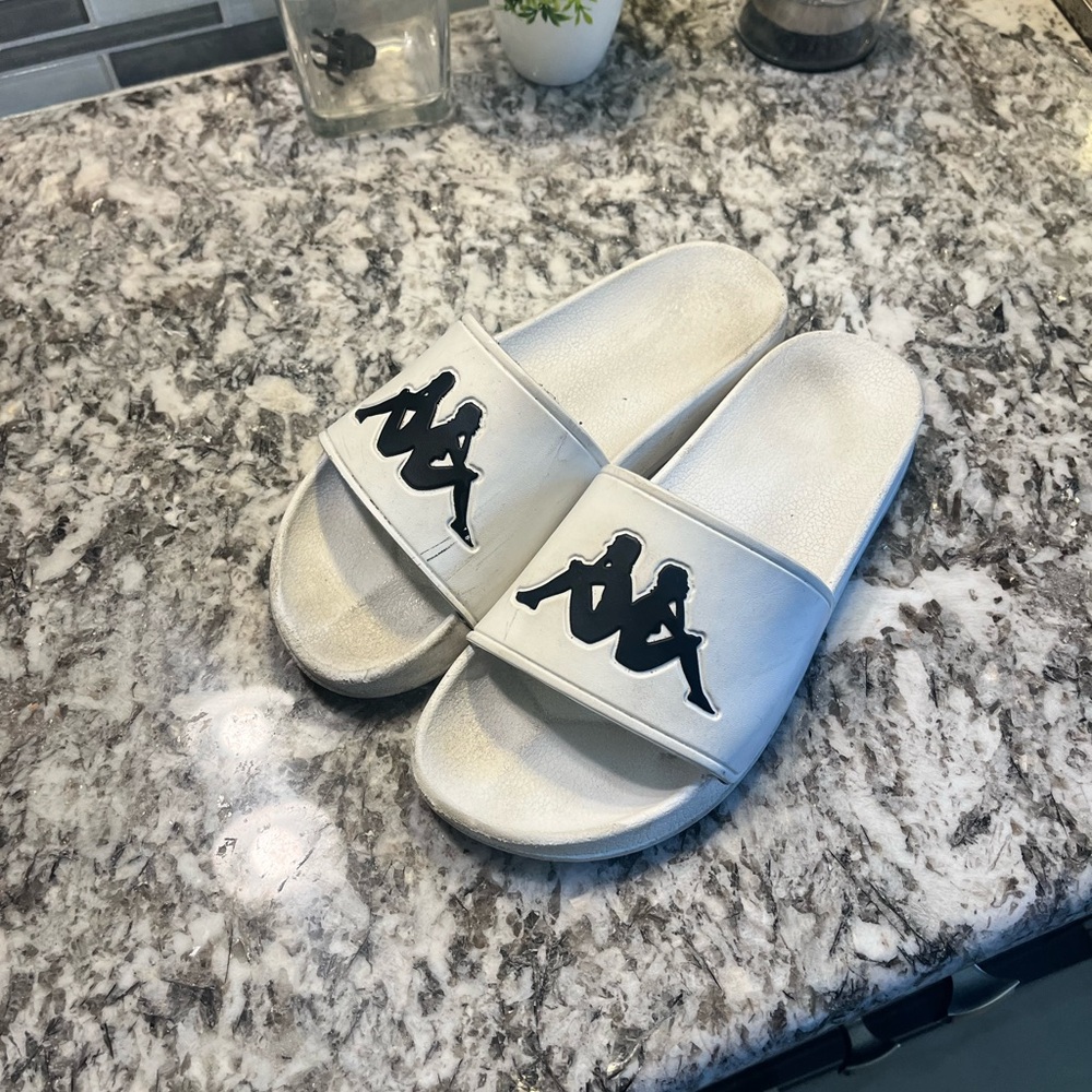 Kappa White and Black Logo Slides